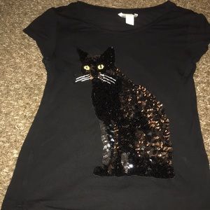 A black sequin shirt.